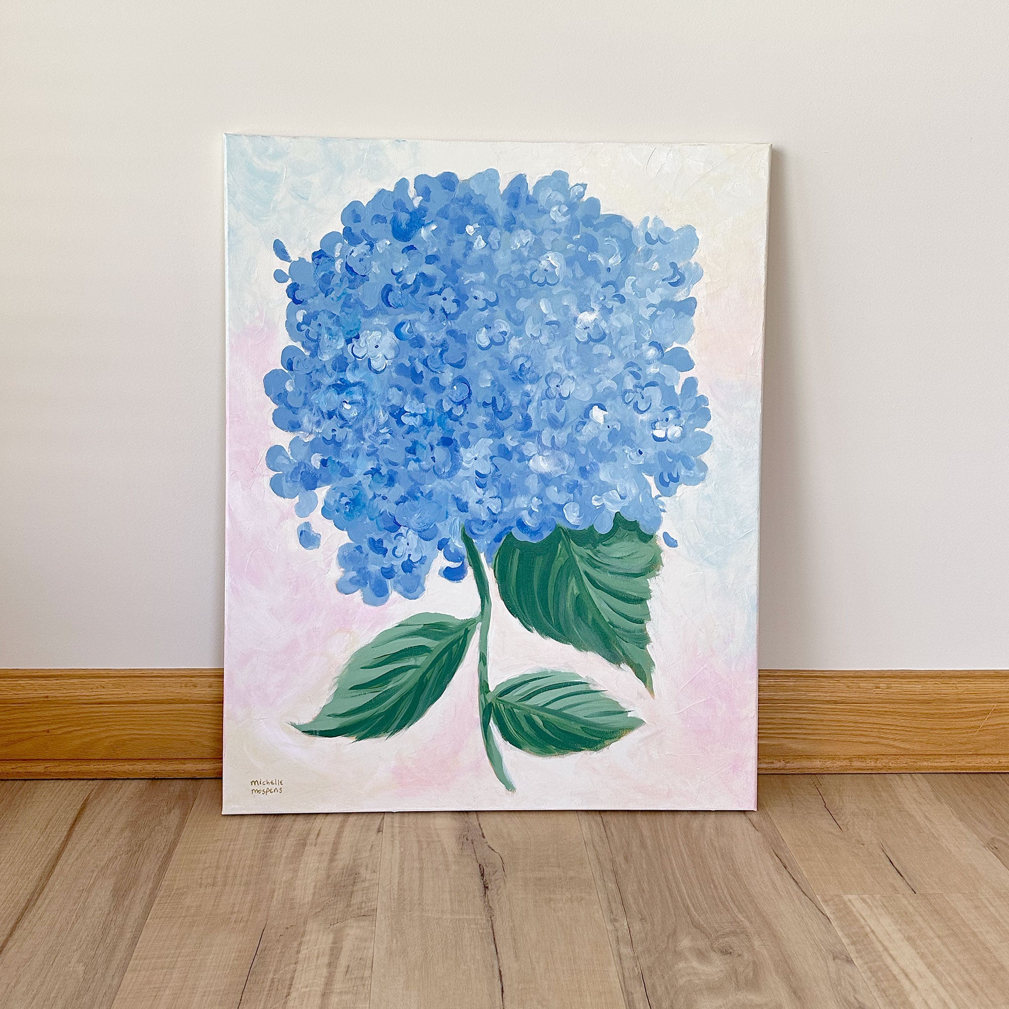 Large canvas painting of a blue hydrangea flower with green leaves on a light background, 24" x 30"