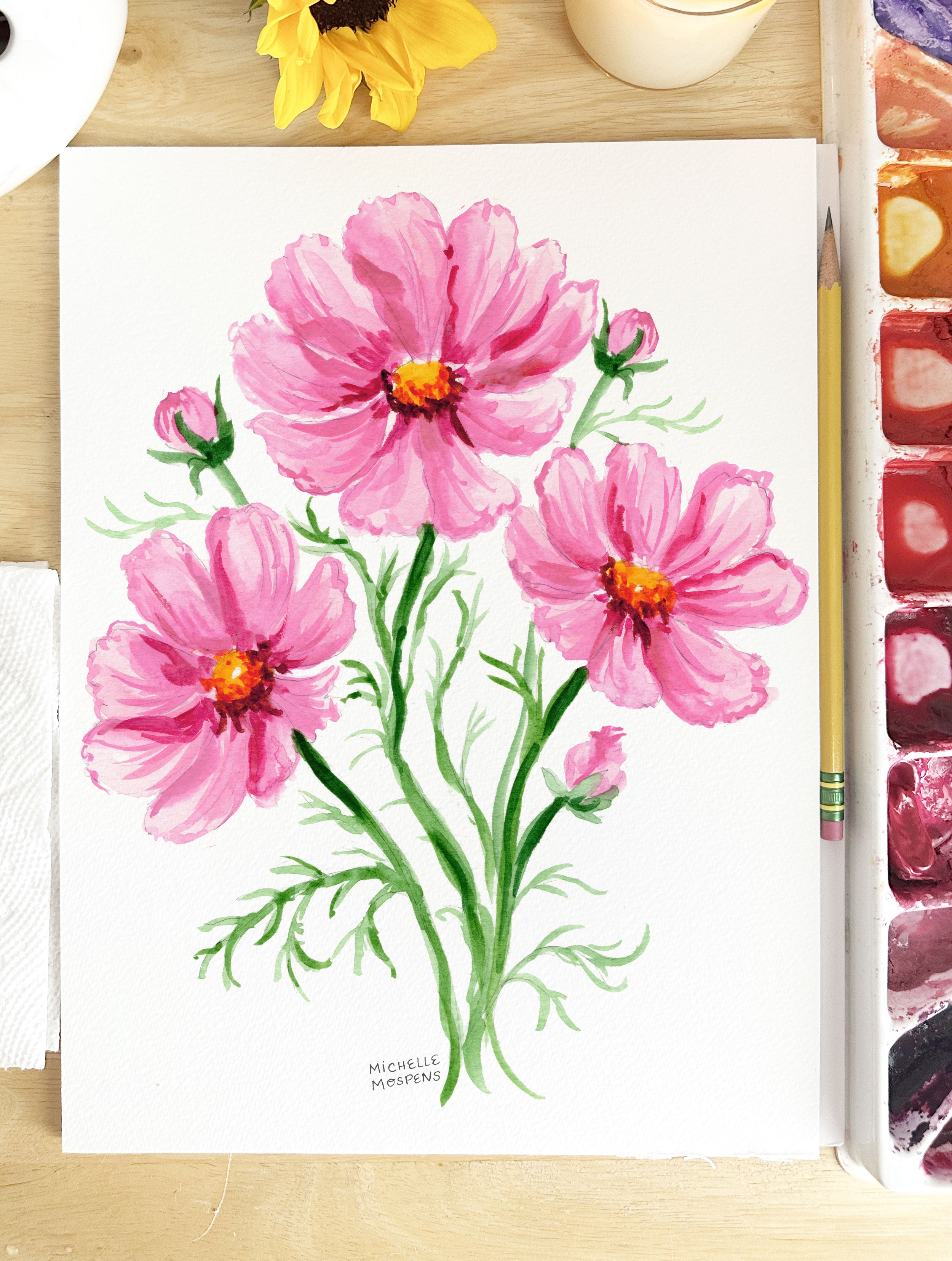 This pink cosmos botanical art print depicts an artful posy of blooms in Michelle Mospens' signature watercolor style. A charming illustrated floral wall art that brings a burst of cheer and romance to your home. Display this floral watercolor artwork on its own or artfully mixed amongst other whimsical art. Perfect for gardeners or the floral-loving host.