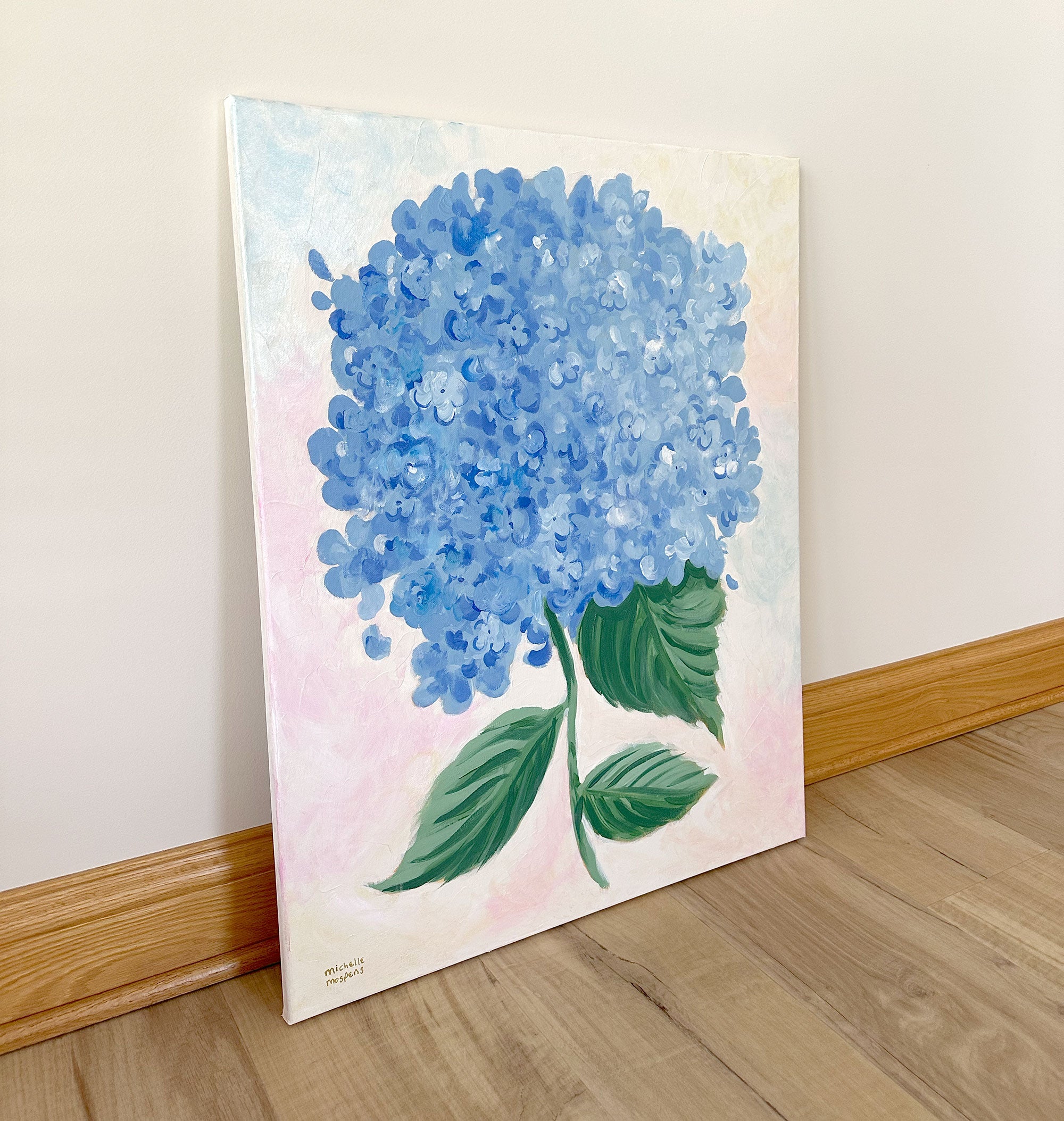 Large canvas painting of a blue hydrangea flower with green leaves on a light background, 24" x 30"