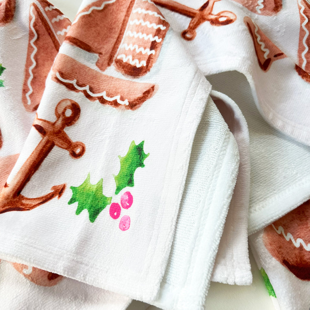 https://michellemospens.com/cdn/shop/files/light-pink-gingerbread-cookie-soft-kitchen-dish-towels-upclose_1024x.jpg?v=1699653078