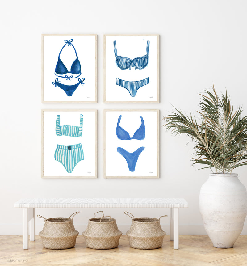 Watercolor bikini bathing suits in blue hues by artist Michelle Mospens. Wall art prints set of 4 in several different sizes.