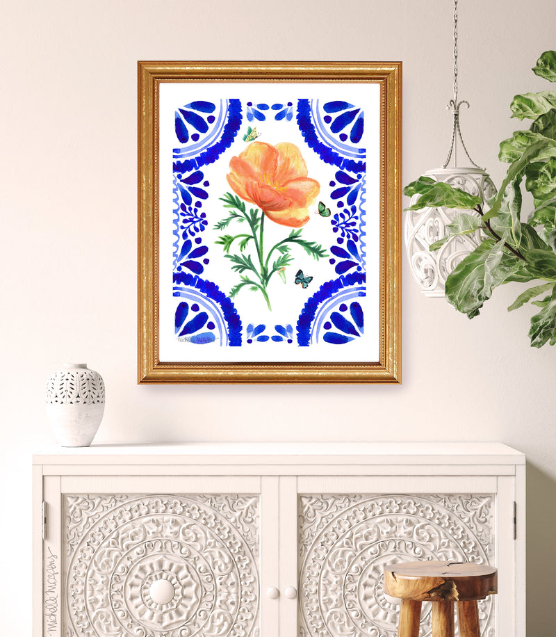 Make any room bloom with this beautiful Talavera-inspired Mexican tile wall art print! Featuring a vibrant, hand-painted golden poppy flower in orange and blue, it's sure to give your space plenty of personality. So go ahead, show your walls some love, and brighten up your boho-chic vibes!
